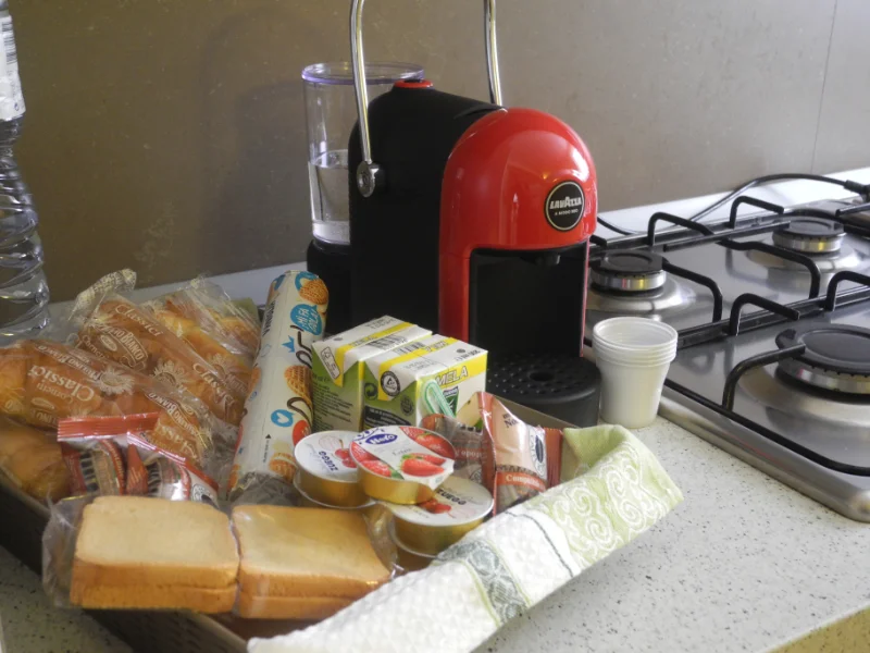 affitto breve Palermo entro caffè In questa immagine è mostrata la macchina del caffè del Prince Moncada affitto breve a Palermo centro